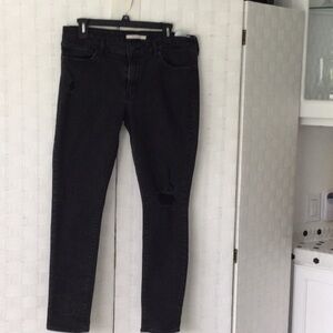 Woman’s Levi’s Skinny Jeans Size 33 color black zipper front washable